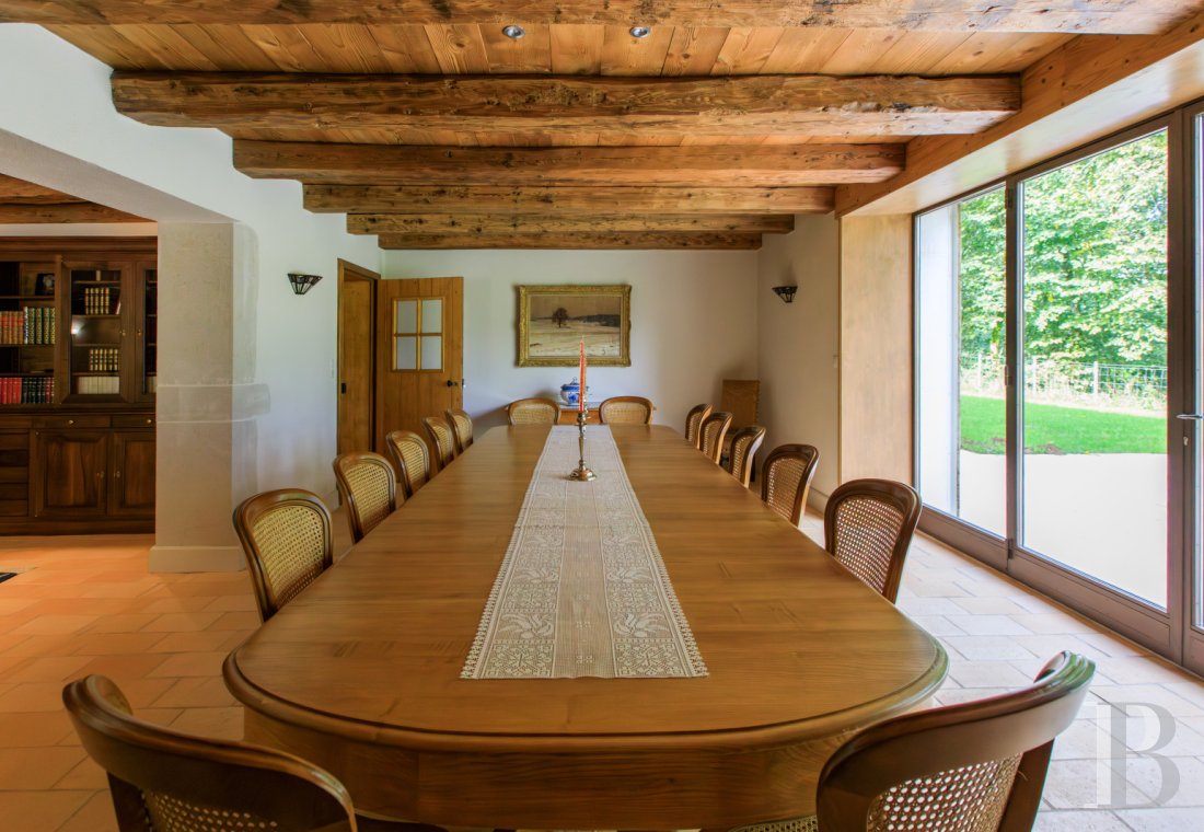 A former livestock farm which has been transformed into a vast, comfortable home near to Nantua in the Haut-Bugey region - photo  n°7